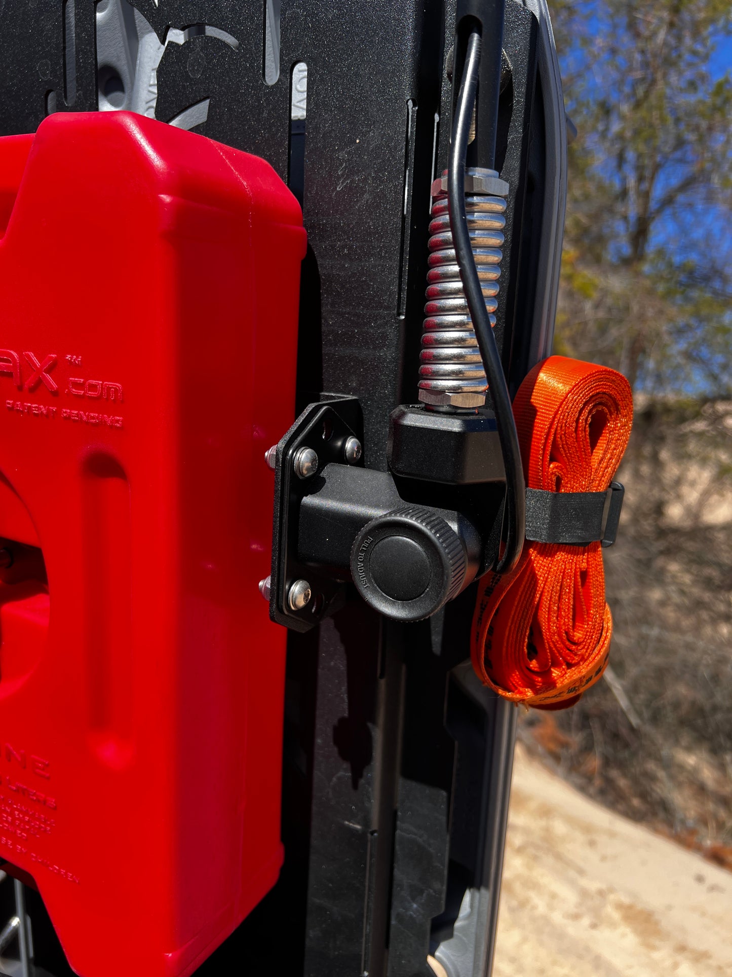 90° Weboost adapter shown mounted vertically on a universal off-road, mounting plate up close